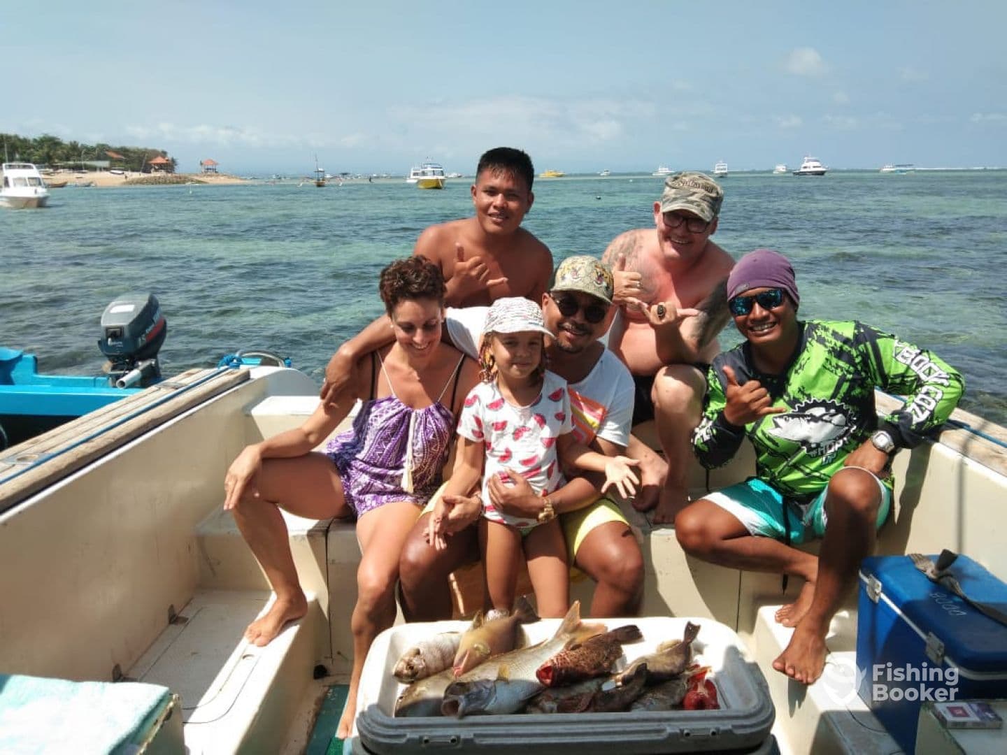 Happy group of anglers after a Bali fishing trip